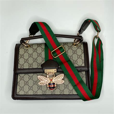 camouflage gucci bag with cloth red and grren bee strap|Gucci tote bag.